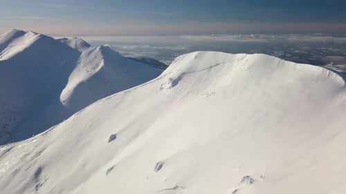 Aerial View of Frozen Winter Mountains