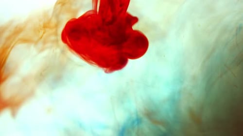 Abstract Background with Orange Red and Teal Paint