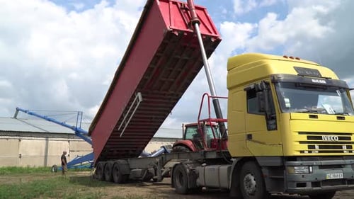 Truck and Tractor in a Rural Environment