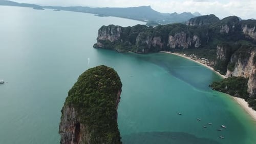 Breathtaking Coastline of Thailand. Aerial View on White Sand Beach Lagoon Under Steep Ridges Over T