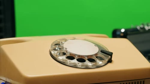 Retro Vintage Phone on Chroma Key Green Screen Rotary Telephone is Displayed on a Wooden Desk Adding