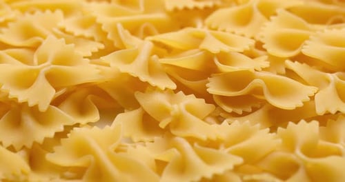 Pasta Backgroud Macro View of Dry Authentic Italian Farfalle