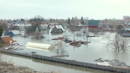 Flood Engulfs Village Leaving Houses Partially Submerged