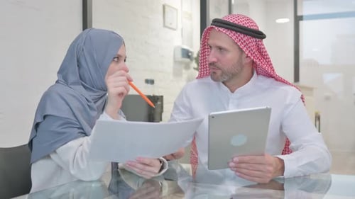 Muslim Entrepreneurs Working Together in Office