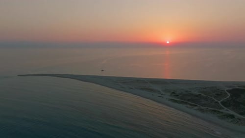 Aerial Footage of Sunset and Yacht Near Possidi Cape Greece