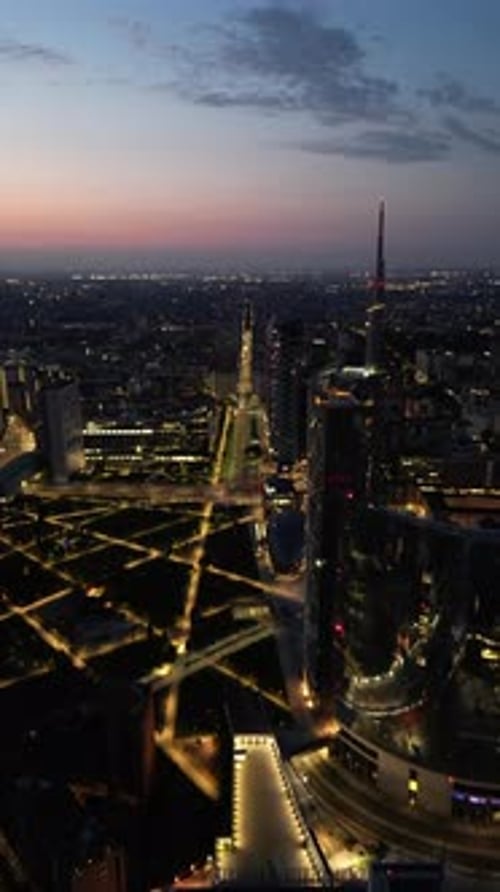 Aerial video above the skyscrapers of Milan city