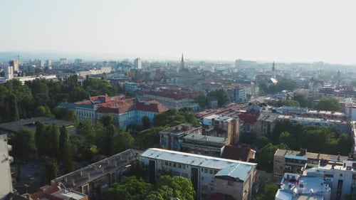 Novi Sad city roofs and church in fog