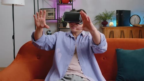 Young Adult Immersed in Virtual Reality Experience
