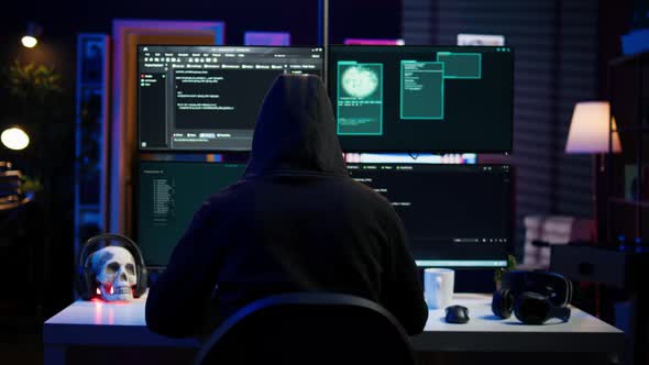 Experienced Hacker Writing Lines of Code on Computer From Underground ...