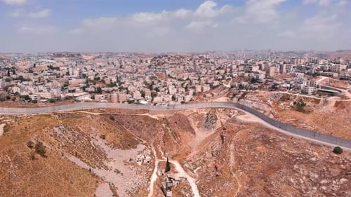 Aerial view over qalandiya refugee camp and the security wall