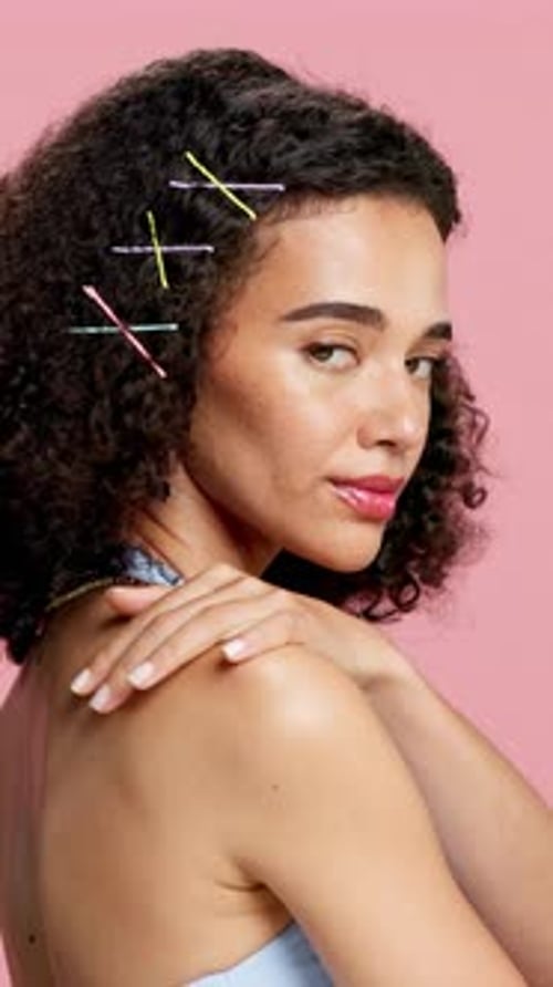 Beauty, smile and face of woman in studio for salon, self care and makeup shine