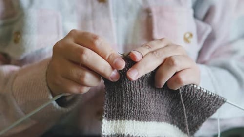Woman Knitting with Needles and Yarn, Close Up