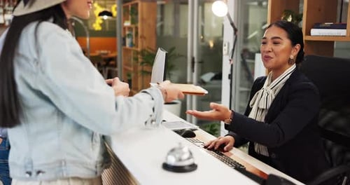 Hotel, receptionist and guests with passport for check in, reservation and concierge service