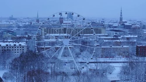 A Serene Winter Morning Overlooking the Snowy City Ferris Wheel