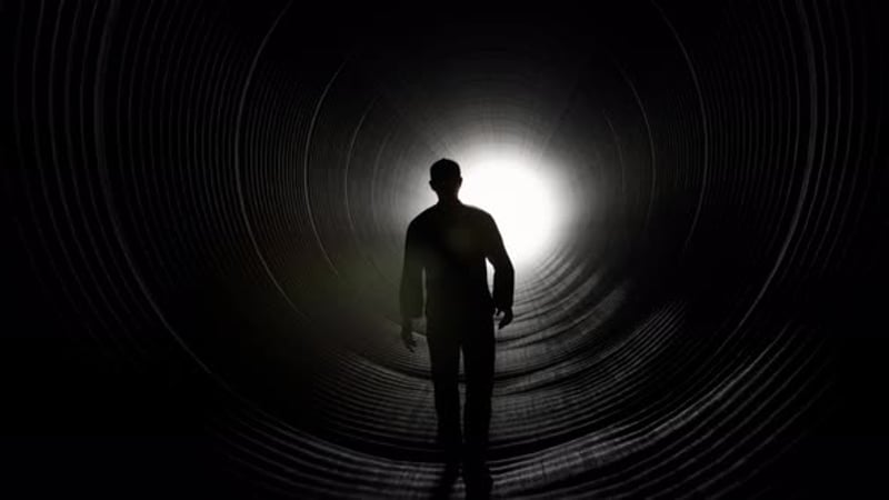 Silhouette of Man Walking Towards Light in Dark Tunnel, Backgrounds ...