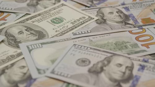 Pile of Crisp One Hundred Dollar Bills