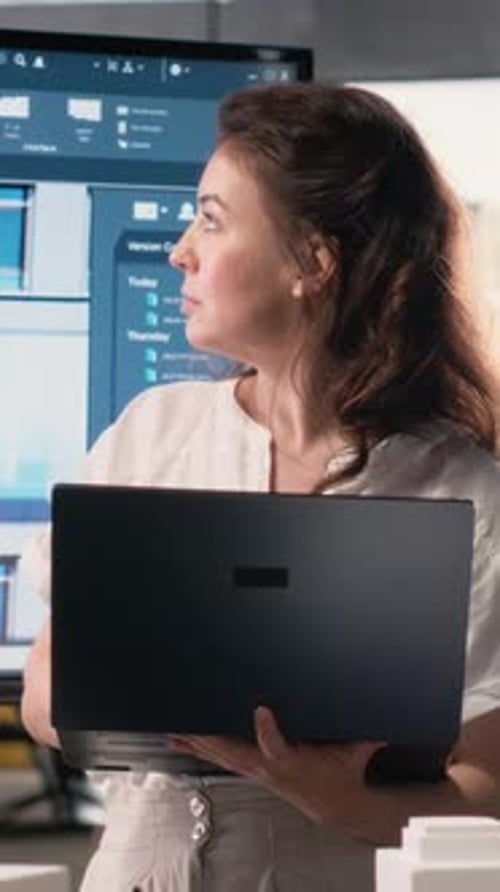 Vertical Video Woman Real Estate Developer Works with 3D Tools and Digital Blueprints