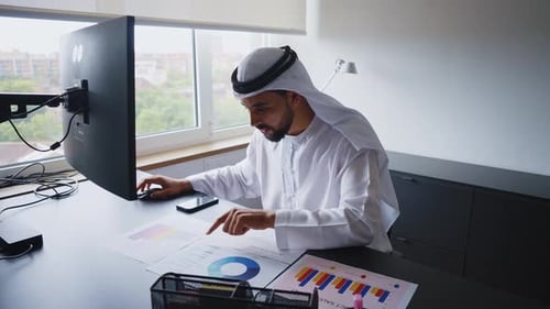 businessman working in a modern office in the united arab emirates.