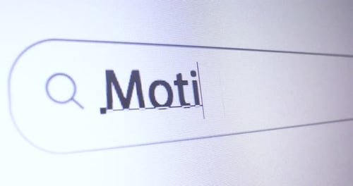 Browser bar with typed Motivation keyword on the computer screen, SEO Concept