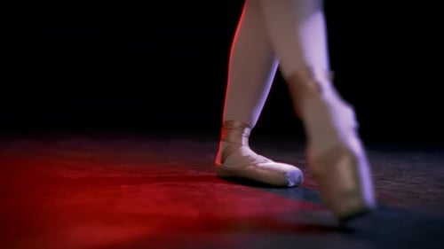 Ballerina Feet Gracefully Dancing on Stage