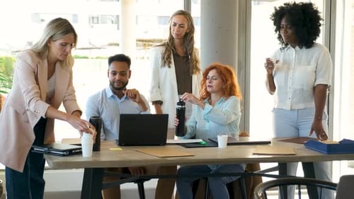 Team Meeting and Collaboration in a Modern Office