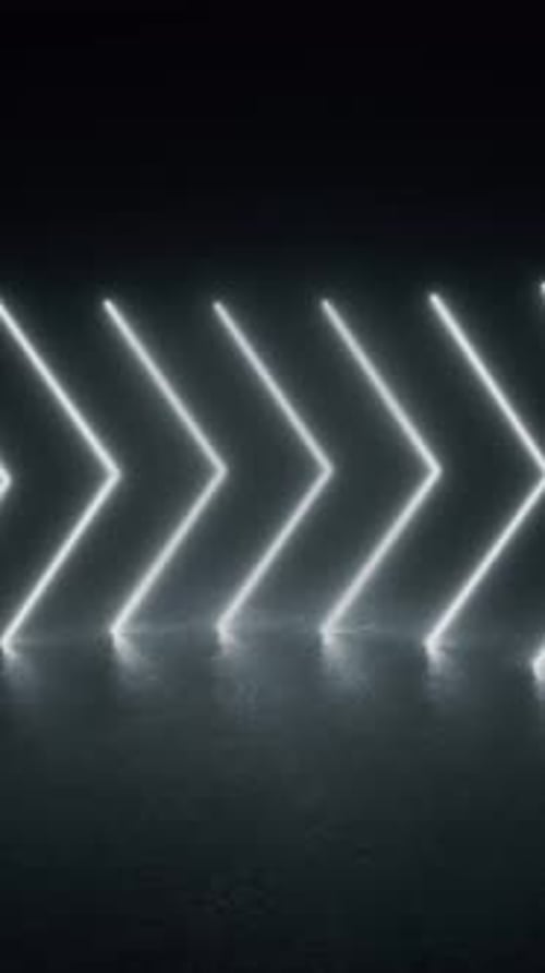A tunnel of neon lights glows