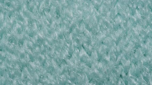 Knitted Warm Blue Hoodie Sweater or Scarf Macro Close Up Texture Cozy Warm Composition of Wool