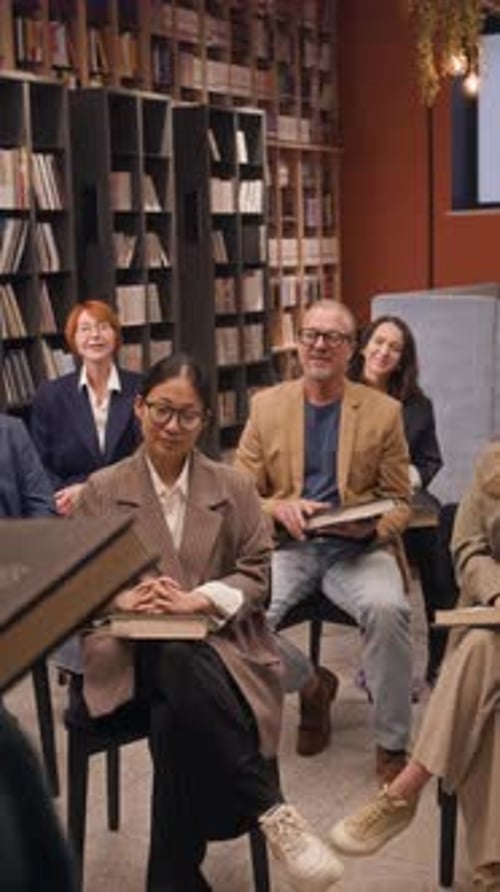 Over-Shoulder Book Presentation Shot