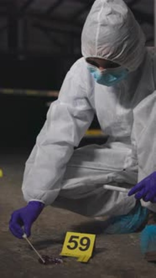 Investigator Collects Evidence at Crime Scene