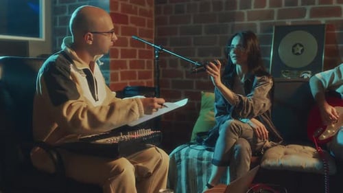 Musical Group Performing in Recording Studio