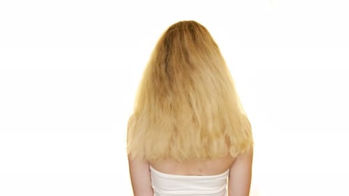 Woman With Blonde Hair Shaking Head