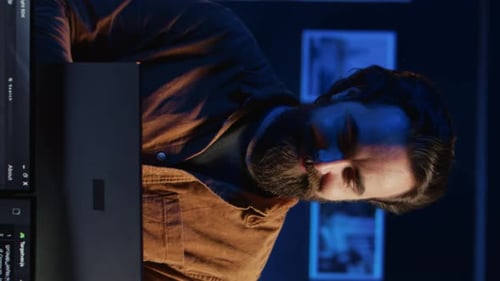 Portrait of Smiling Man Doing IT Support Job From Home Standing in Office