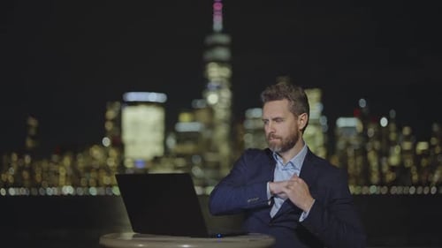 Man in Suit Counting Money at Night Street Counting Us Dollar Bills Money in NYC Finance and Banking