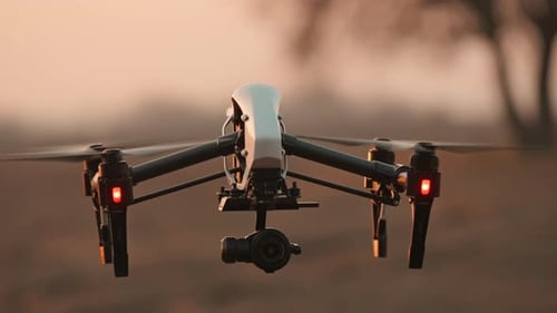Closeup Professional Black and White Flying Drone Quadcopter Modern Device Aircraft Vehicle