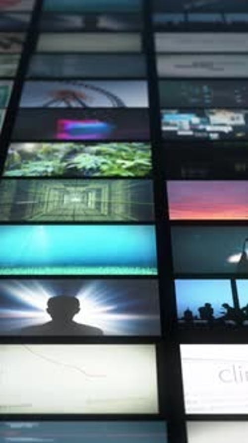 Vertical cinematic composition of a curved media wall showing a stream