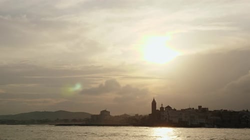 The City Skyline on Sunset Near the Water A Few Clouds on the Sky