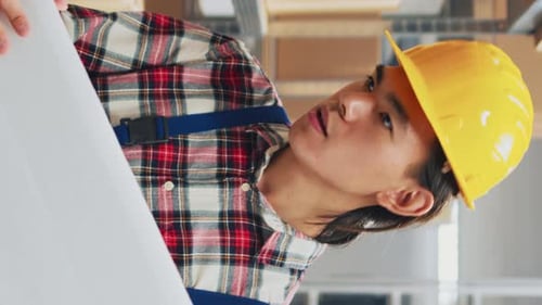 Warehouse Worker Discusses Order with Supervisor