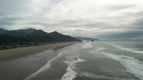 Wide Aerial Drone Shot of Coastal Town Cannon Beach Oregon