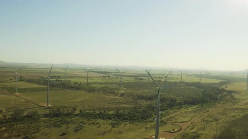 4k video footage of wind turbines out on an open field