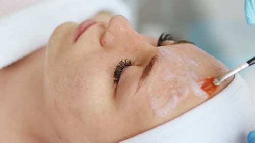 Woman Receiving Facial Treatment at a Medical Spa