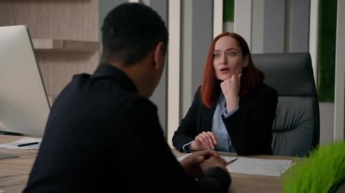 Woman Talking During Business Meeting Shakes Hand