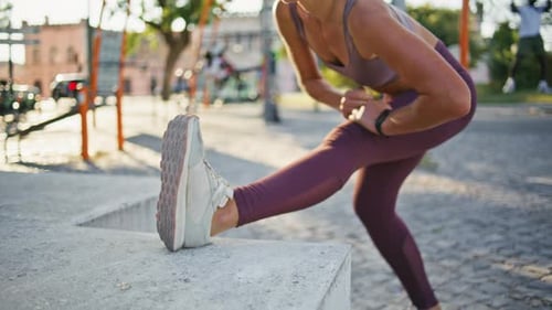 Closeup Woman Legs Stretching at Summer City Gym Unknown Lady Jogger Warming Up