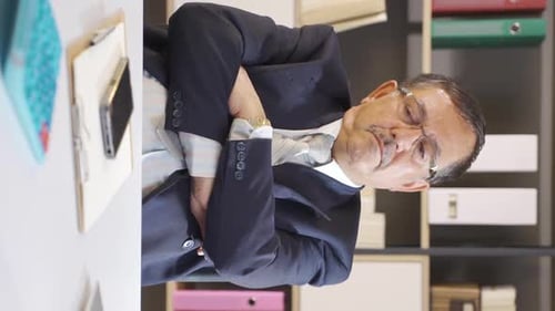Vertical video of Overwhelmed businessman thoughtful.