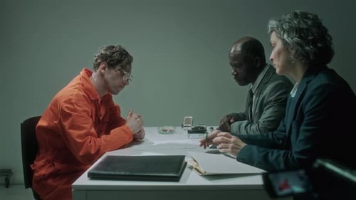 Caucasian Male Crime Suspect Pleading Guilty and Signing Confession