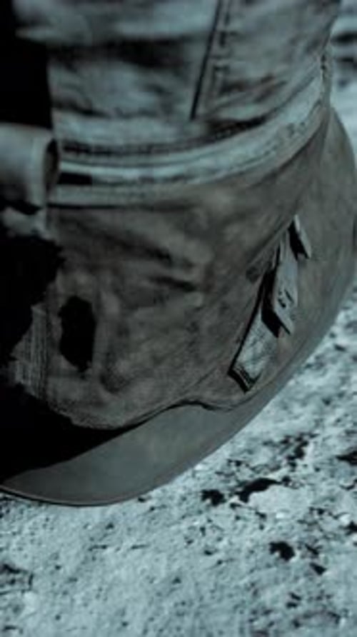 Lunar Astronaut Walking on the Moon's Surface and