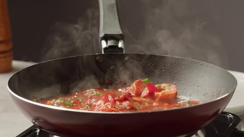 Close Up of Delicious Food Sizzling in Pan