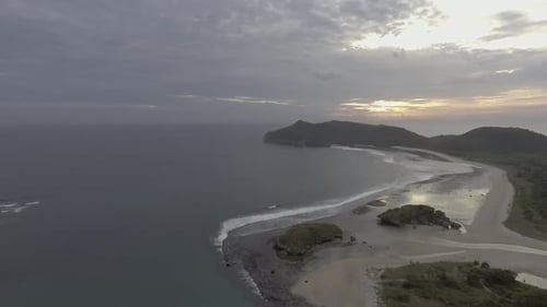 Scenic Aerial View of Coastline at Sunrise
