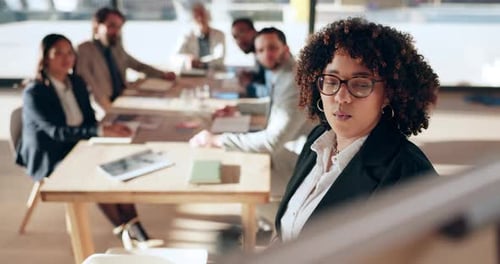Woman Giving Presentation at Corporate Meeting