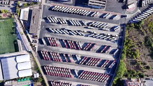 Aerial Top Down View of Bus Terminus is Designated Place Where Bus or Coach Starts or Ends Its