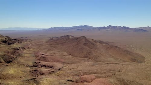 Aerial Arid Hill Desert Landscape In California. Dolly Right, Establishing Shot